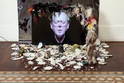 Dirty Songs, 2019, video installation, hd video, sound, TV, Gainsbourg 10 years urine oxidized silver on plaster, grump ostrich feathers, sneakers balls, urethane resin, embroidery, plastic suits, glass cullets, paper leaf and flowers, black mirror foil, video 2'30'', overall dimension variable 